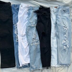 7 pairs of woman’s jeans sizes 10-14. AMERICAN EAGLE GOOD AMERICAN ETC